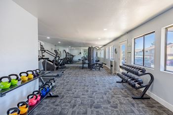 Fully equipped fitness center at sunset winds apartments in henderson, nv 89014
